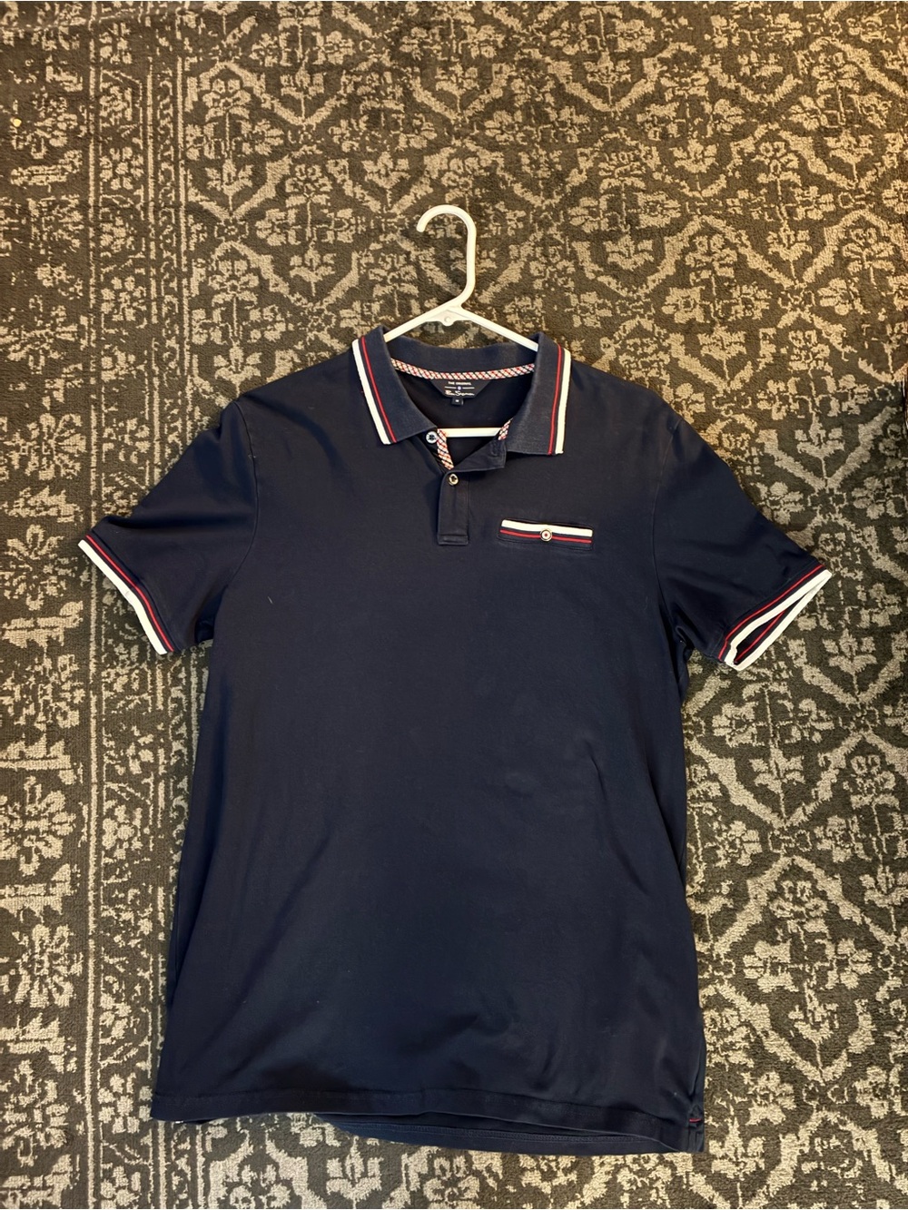 Ben Sherman Navy polo with red/ white trim and front pocket.